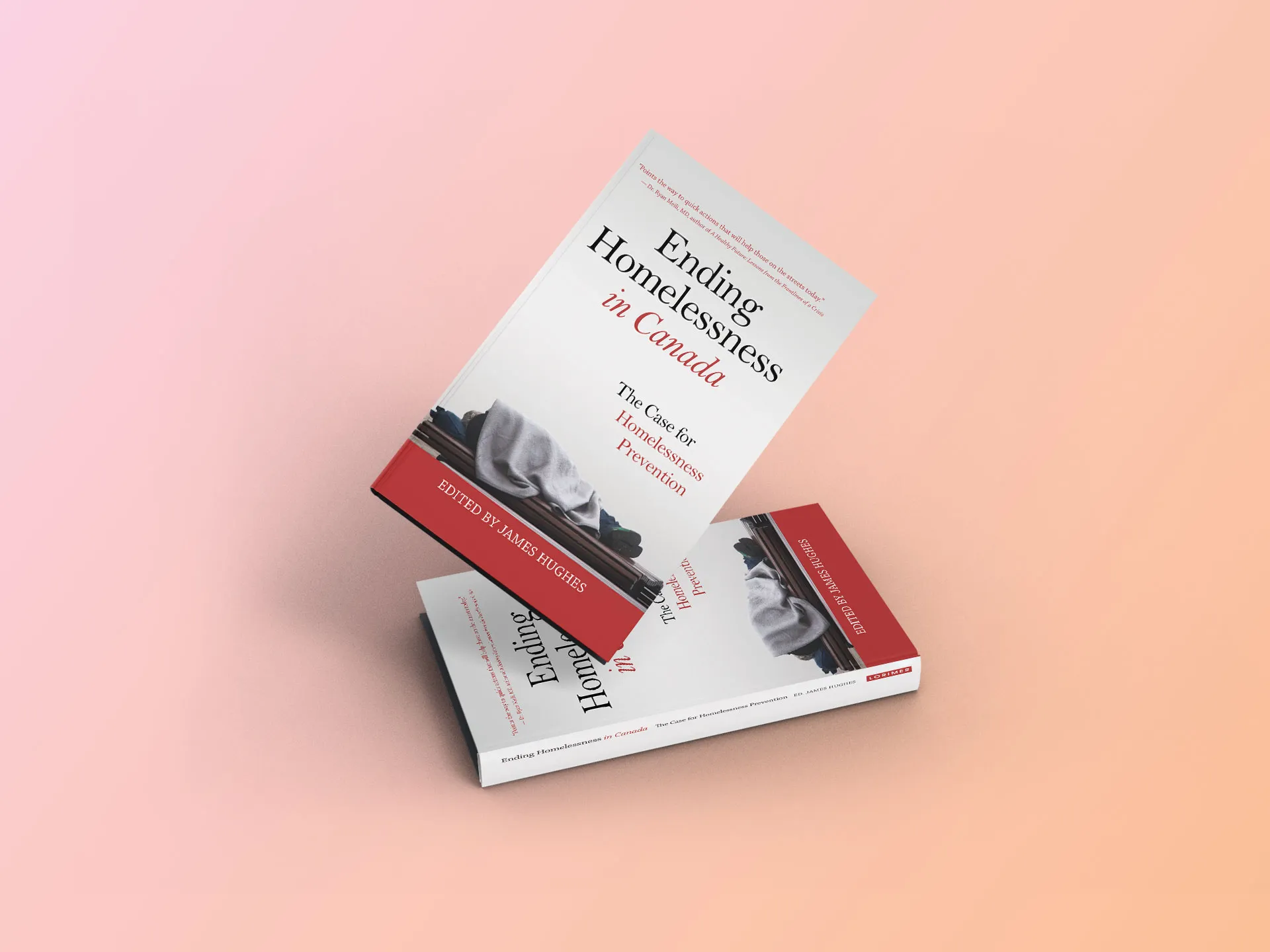 Photo de deux exemplaires du livre Ending Homelessness in Canada.