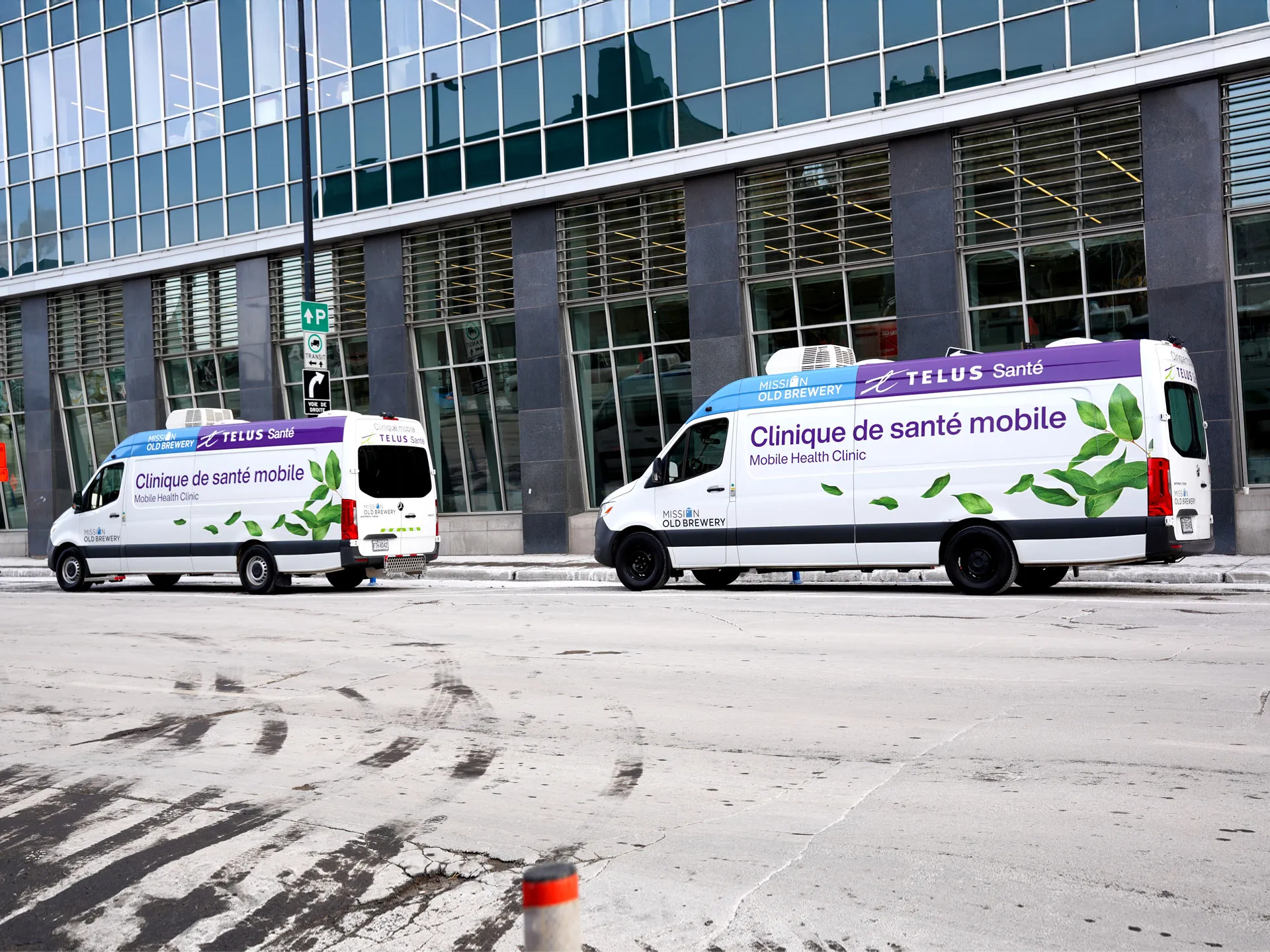 Photo of the two mobile clinics parked one behind the other.