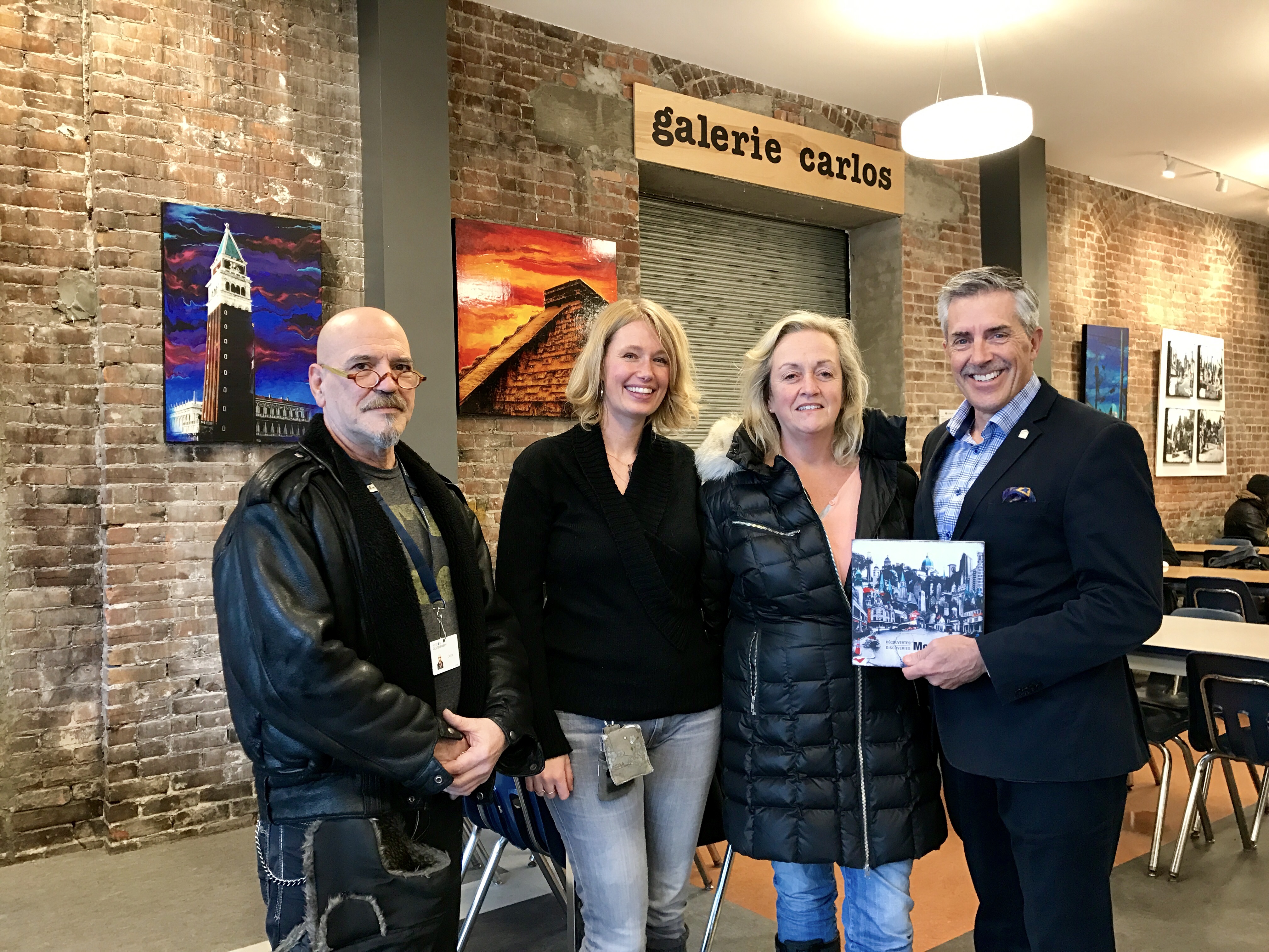 Carlos Anglarill, counselor at the Mission and founder of Gallery Carlos, Denise Buisman Pilger, contributing artist, Karen Hosker, contributing artist and Gallerie Carlos curator and Matthew Pearce, President and CEO of Old Brewery Mission.
